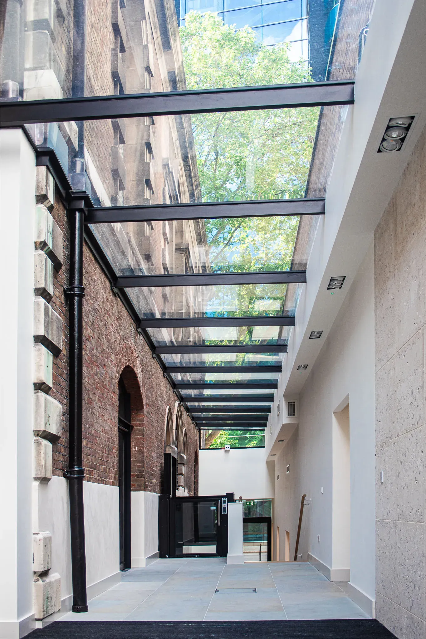 Covered walkway between heritage buildings, part of adaptable venue access